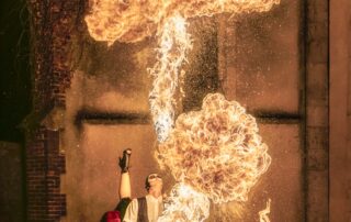 Portrait maquillé sous le thème du Día de los Muertos avec du Feu.